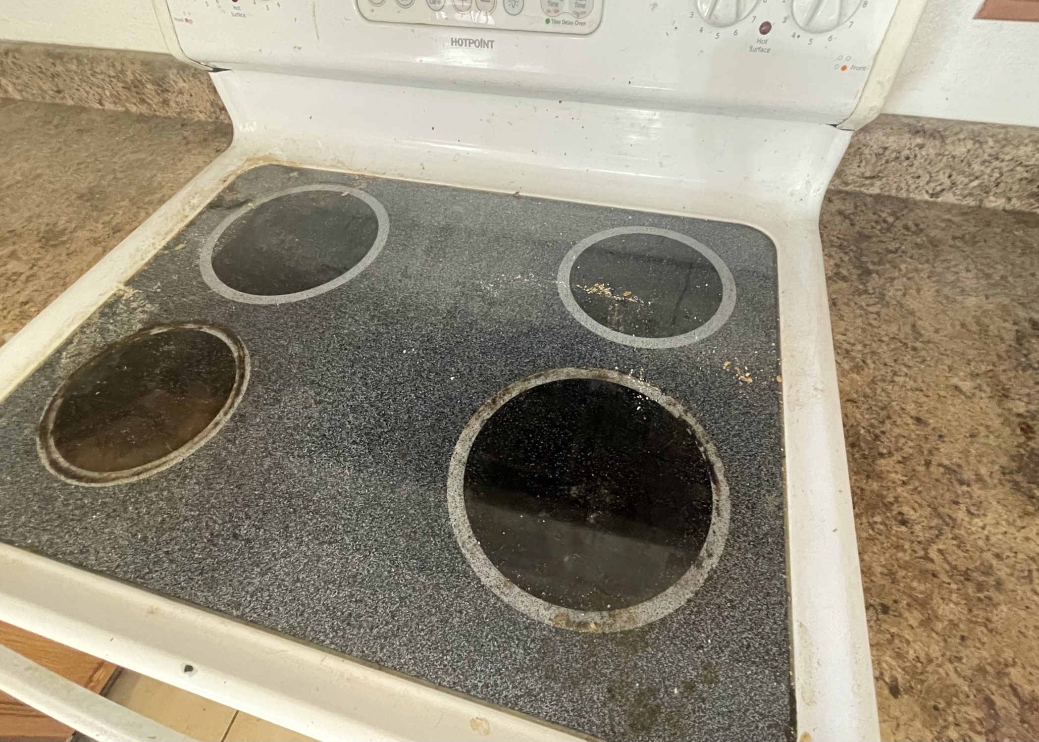 Glass cooktop before Canyon Cleaning service